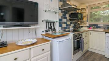 Fridge, electric kettle, toaster, cookware/dishes/utensils