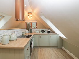 Fridge, dishwasher, electric kettle, cookware/dishes/utensils