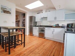 Fridge, dishwasher, cookware/dishes/utensils