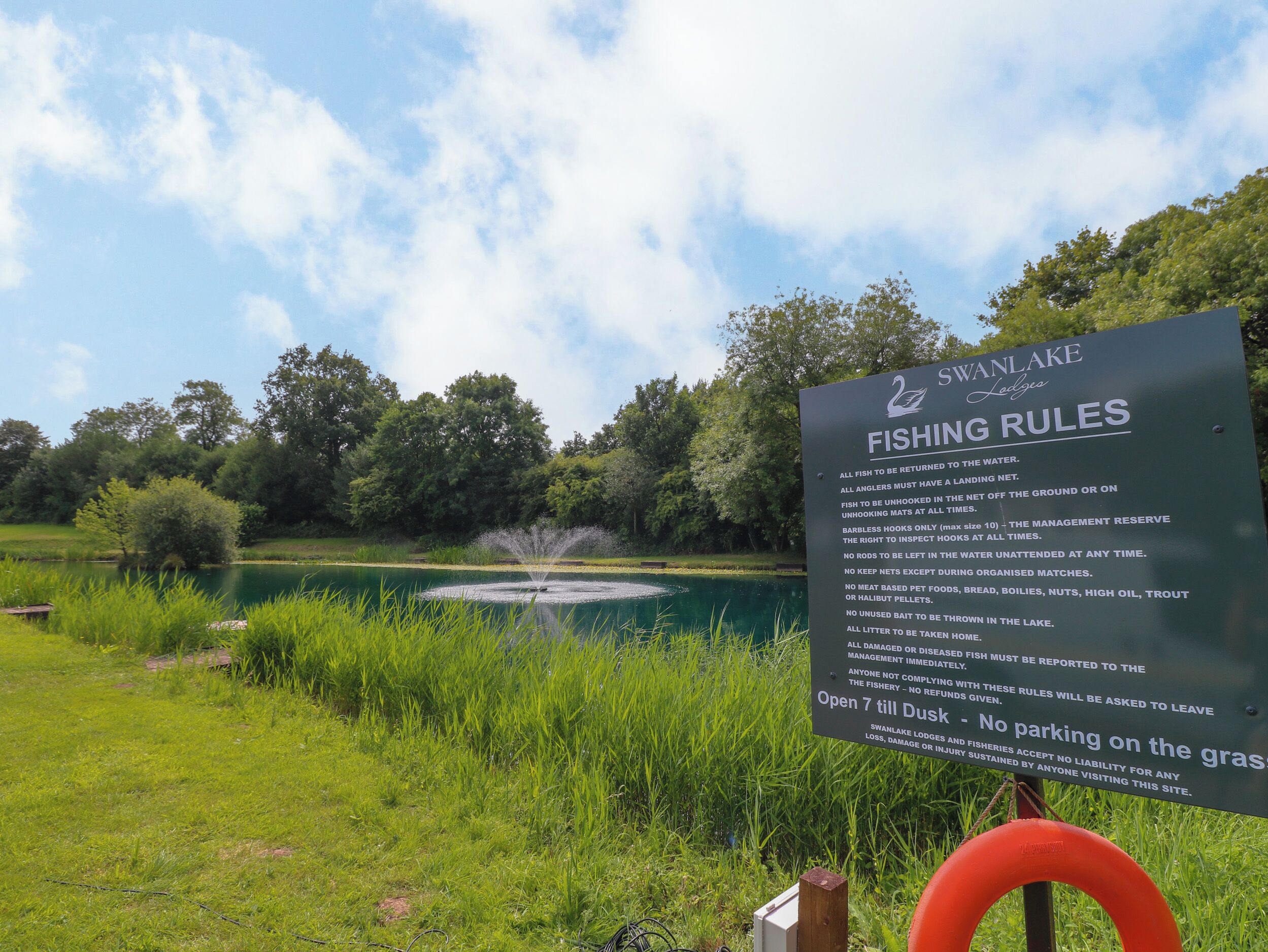 A sign with fishing rules at Swanlake Lodges.