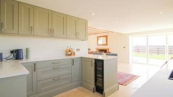 Fridge, dishwasher, electric kettle, cookware/dishes/utensils