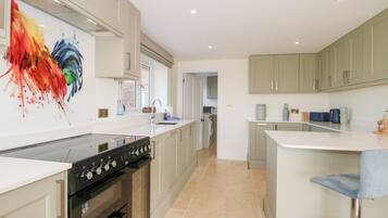 Fridge, dishwasher, electric kettle, cookware/dishes/utensils