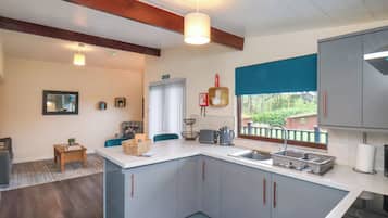 Fridge, electric kettle, toaster, cookware/dishes/utensils