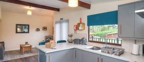 Fridge, electric kettle, toaster, cookware/dishes/utensils