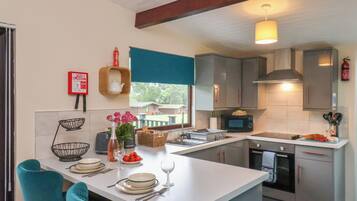 Fridge, electric kettle, toaster, cookware/dishes/utensils