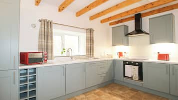 Fridge, dishwasher, electric kettle, cookware/dishes/utensils