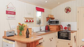 Fridge, electric kettle, cookware/dishes/utensils