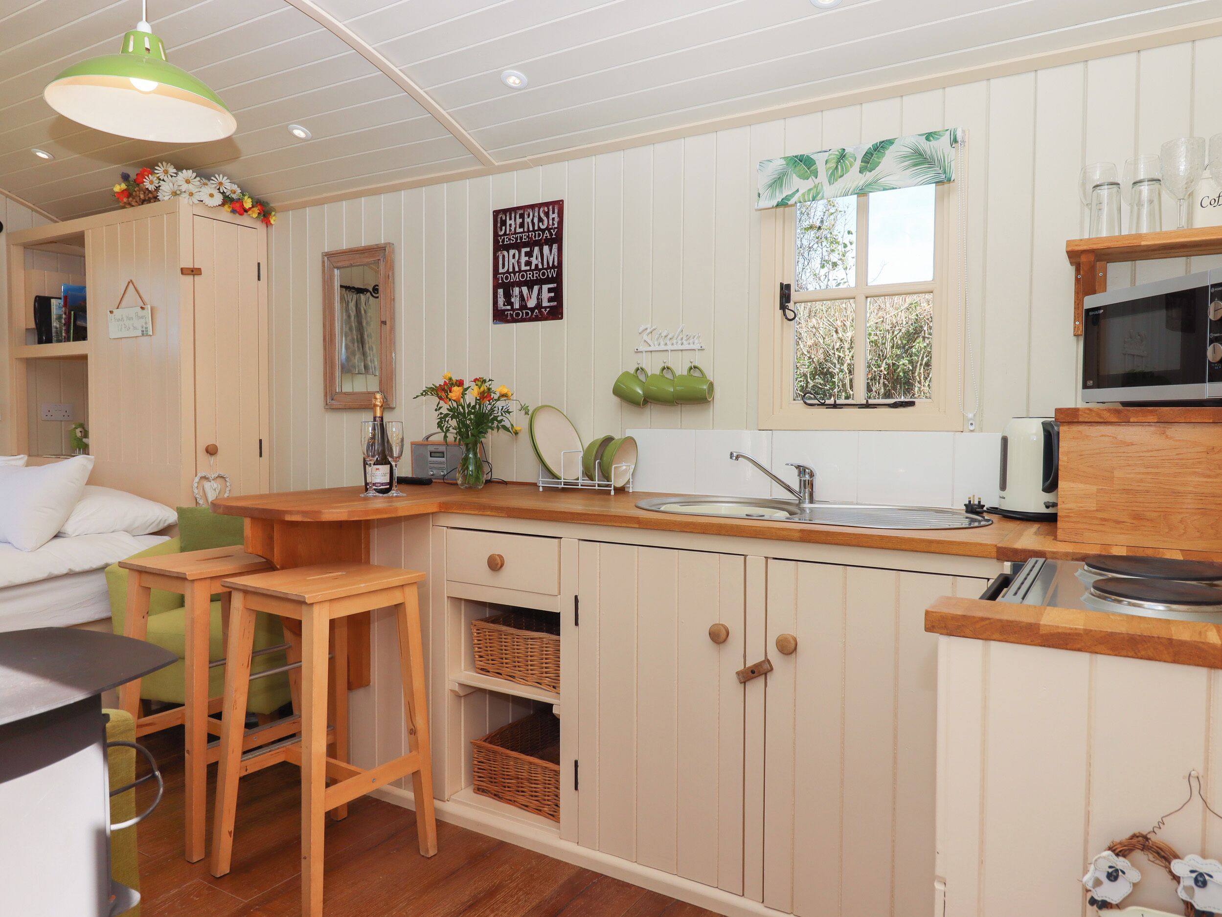 Fridge, electric kettle, cookware/dishes/utensils