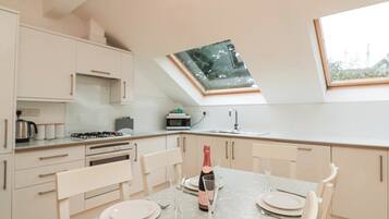 Fridge, dishwasher, cookware/dishes/utensils