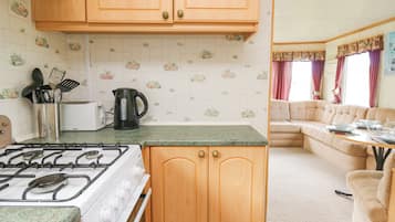 Fridge, electric kettle, toaster, cookware/dishes/utensils