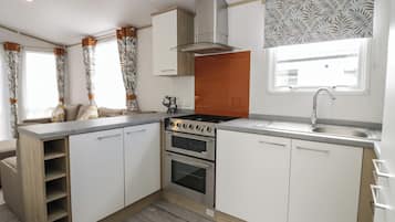 Fridge, electric kettle, toaster, cookware/dishes/utensils