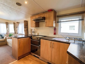 Fridge, electric kettle, toaster, cookware/dishes/utensils