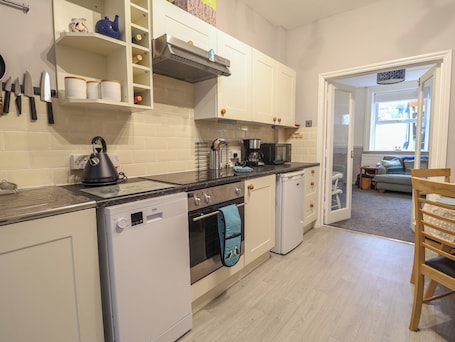 Fridge, dishwasher, electric kettle, cookware/dishes/utensils