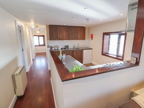 Fridge, dishwasher, electric kettle, cookware/dishes/utensils