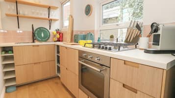 Fridge, electric kettle, toaster, cookware/dishes/utensils