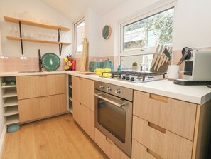 Fridge, electric kettle, toaster, cookware/dishes/utensils