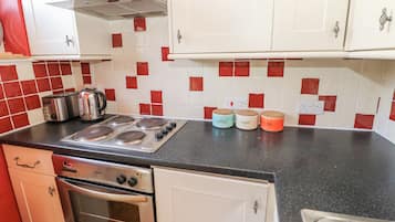 Fridge, electric kettle, toaster, cookware/dishes/utensils