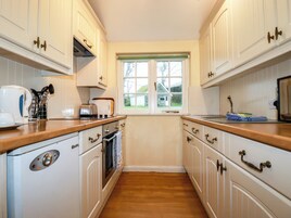 Fridge, electric kettle, toaster, cookware/dishes/utensils