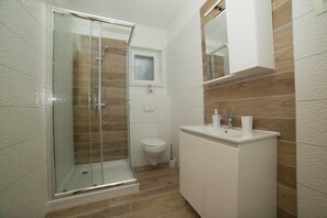 Dutxa, sabó i paper higiènic 