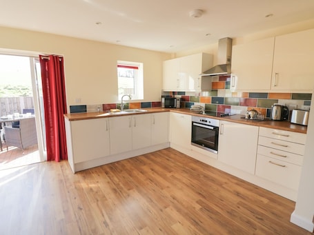 Fridge, dishwasher, electric kettle, cookware/dishes/utensils