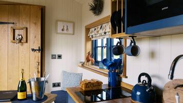 Fridge, electric kettle, toaster, cookware/dishes/utensils