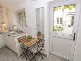 Fridge, electric kettle, toaster, cookware/dishes/utensils