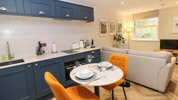 Fridge, electric kettle, toaster, cookware/dishes/utensils
