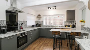 Fridge, dishwasher, cookware/dishes/utensils