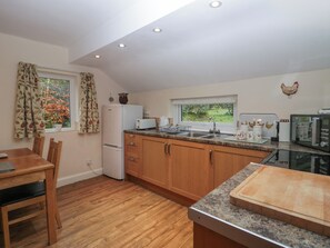 Fridge, electric kettle, toaster, cookware/dishes/utensils