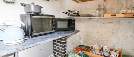 Fridge, electric kettle, toaster, cookware/dishes/utensils