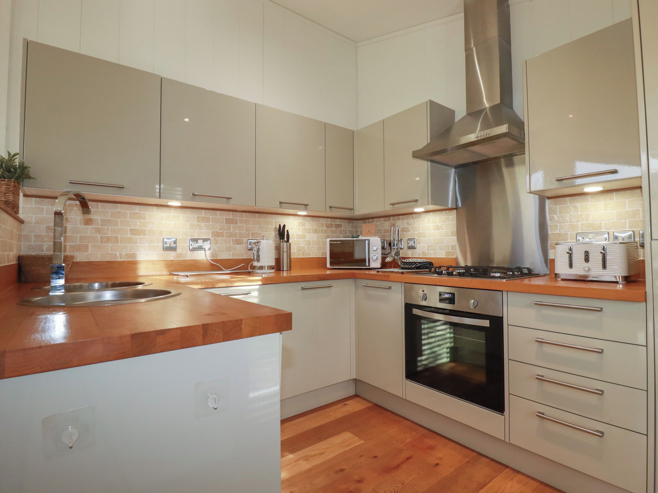 Fridge, electric kettle, toaster, cookware/dishes/utensils