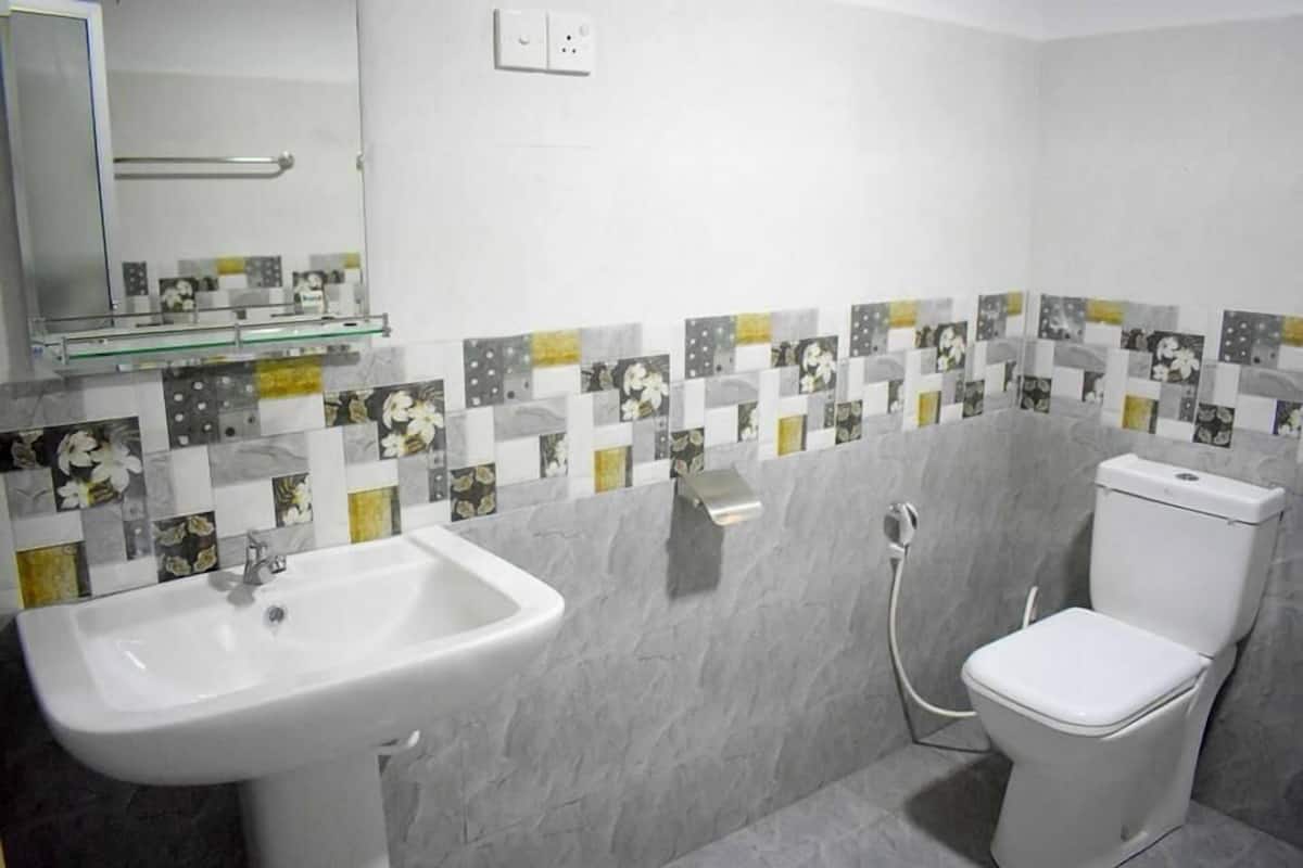 Standard Double Room | Bathroom | Shower, towels, soap, toilet paper