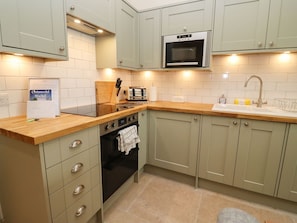 Fridge, dishwasher, electric kettle, cookware/dishes/utensils