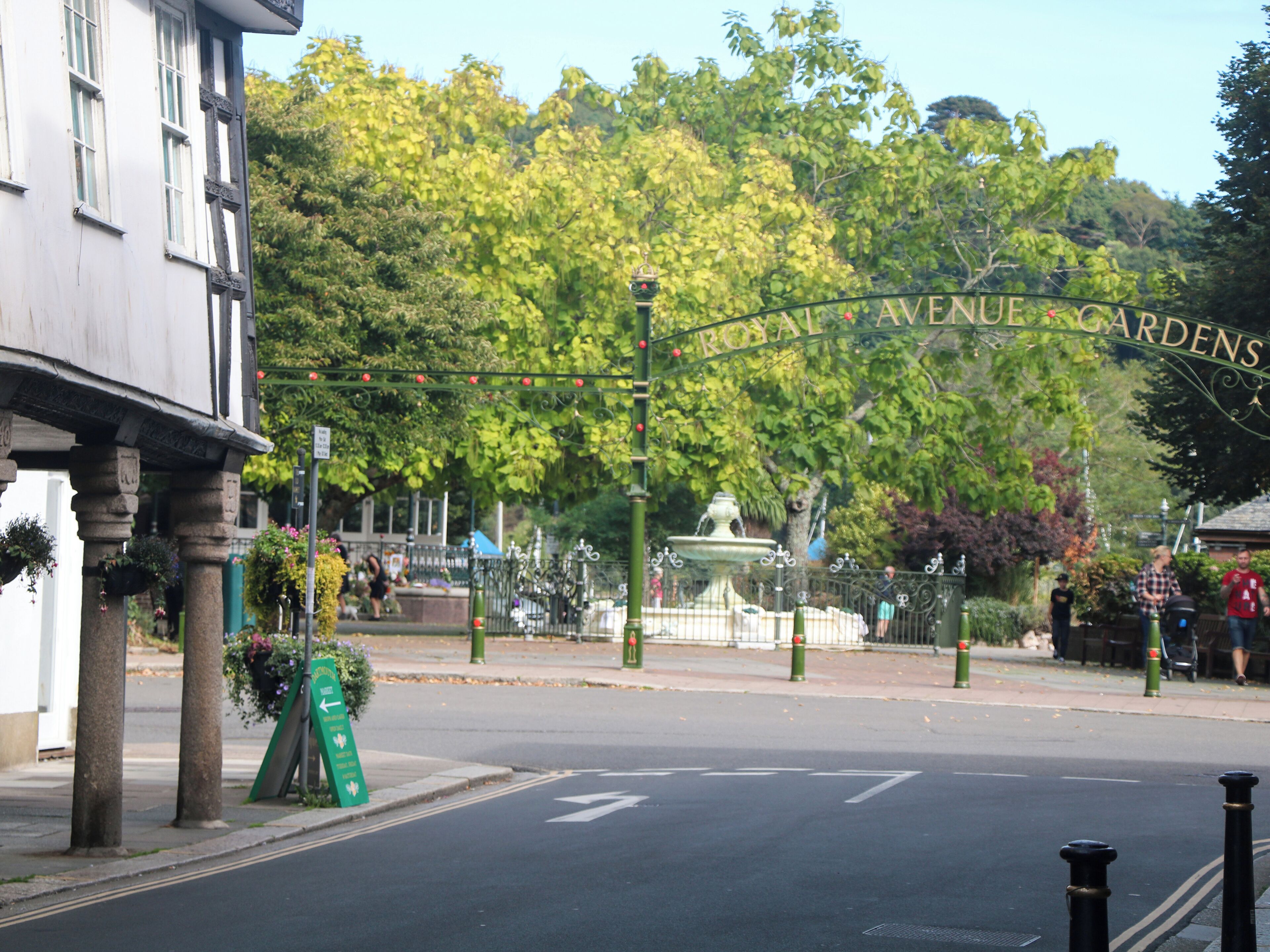 A street view with a sign reading "Royal Avenue Gardens".