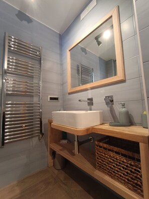 Hair dryer, towels, soap, shampoo