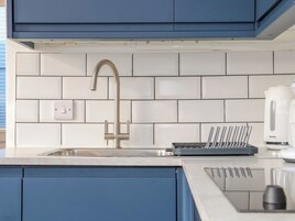 Fridge, electric kettle, toaster, cookware/dishes/utensils