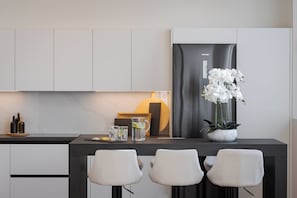 Classic-lejlighed - terrasse - udsigt til have | Privat køkken | Højstol