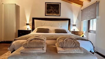 Doppia Deluxe, 1 letto king, vista giardino | Una cassaforte in camera, Wi-Fi gratuito