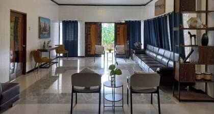 Ginena's panglossian house