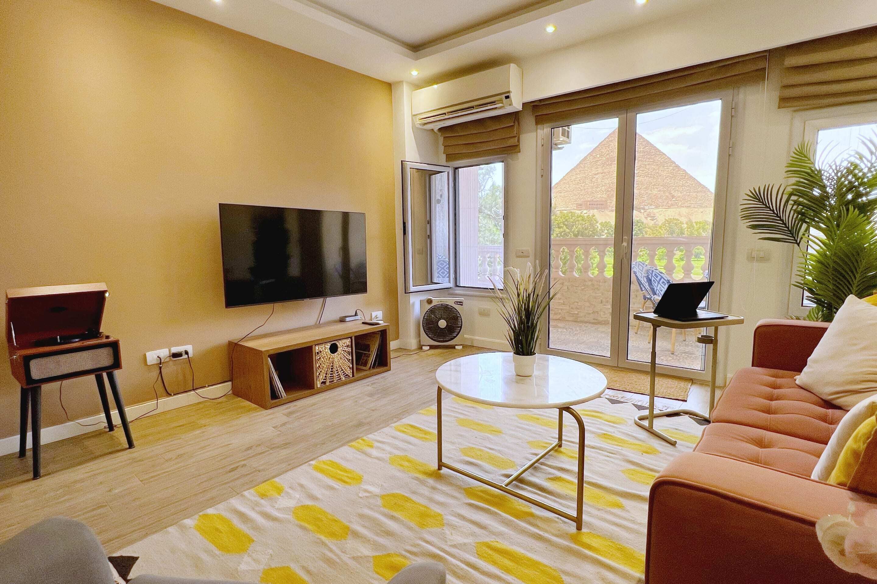 Basic Apartment | Living area | 55-inch Smart TV with satellite channels