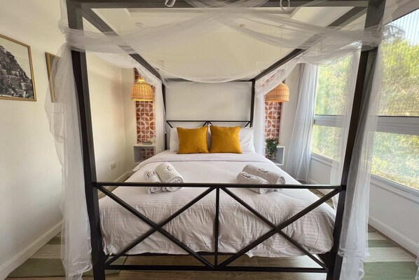 Apartamento básico | 2 quartos, ferros/tábuas de passar roupa, roupa de cama