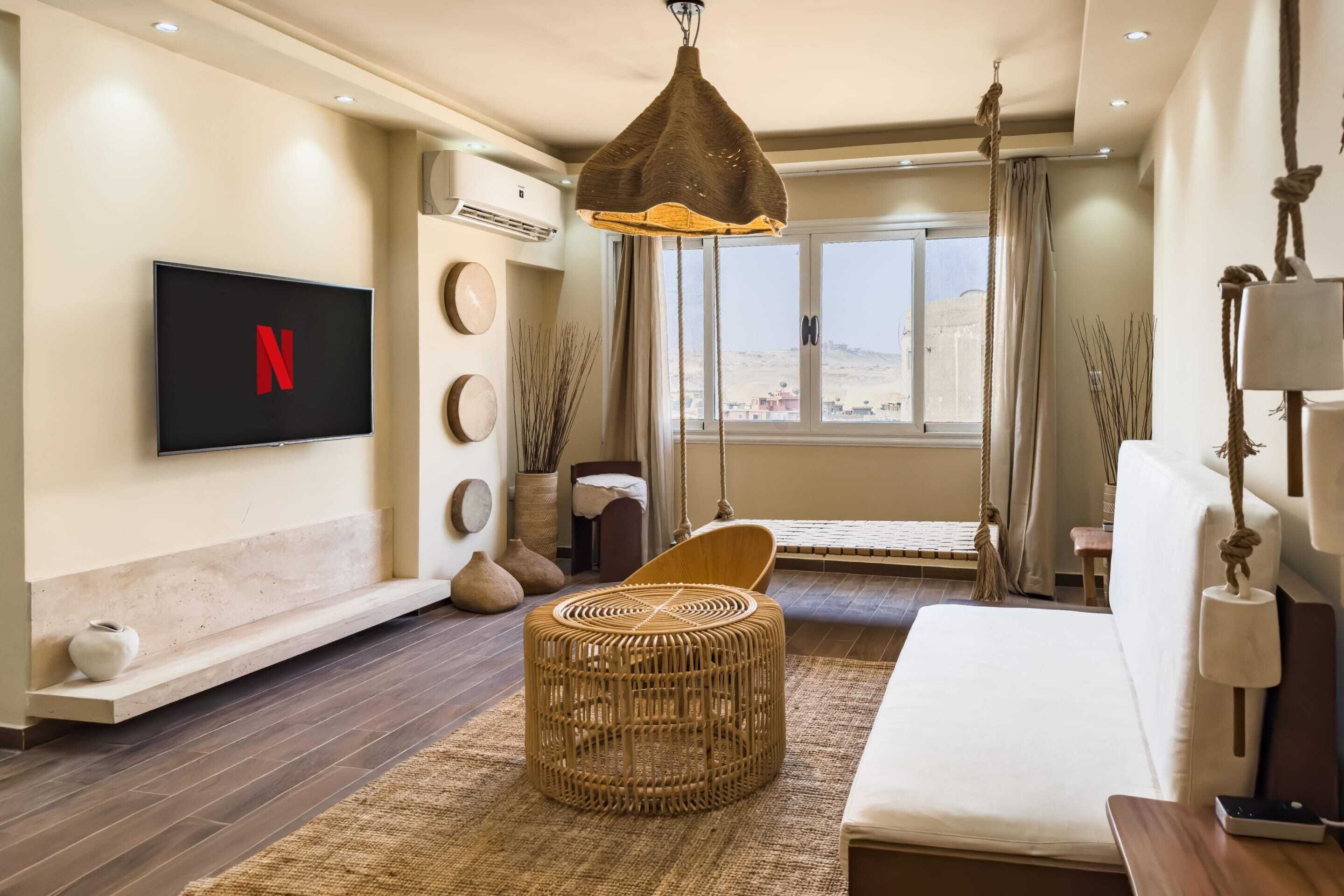 Appartement | Coin séjour | TV connectée de 55 pouces avec chaînes par satellite