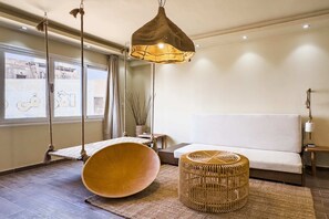 Appartement | Coin séjour | TV connectée de 55 pouces avec chaînes par satellite