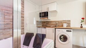 Jetted tub, hair dryer, bidet