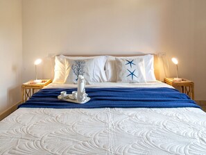 2 habitaciones, tabla de planchar con plancha y cuna de viaje 