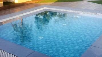 2 outdoor pools, open 9:00 AM to 6:00 PM, pool loungers