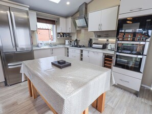 Fridge, electric kettle, toaster, cookware/dishes/utensils