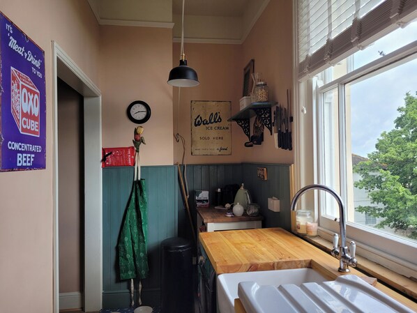 Fridge, electric kettle, toaster, cookware/dishes/utensils