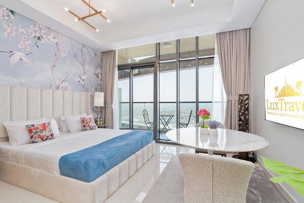 Superior Studio Suite, Ocean View | In-room safe, laptop workspace, blackout drapes, iron/ironing board