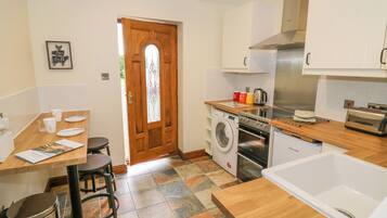 Fridge, electric kettle, toaster, cookware/dishes/utensils